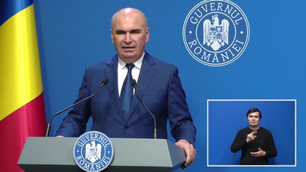 cum-a-reusit-guvernul-bolojan-sa-reduca-deficitul-bugetar:-a-redus-investitiile-de-la-buget,-a-taiat-peste-3-miliarde-lei-de-la-salarii-si-a-incasat-cu-11-miliarde-mai-mult-din-taxarea-muncii