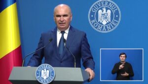 cum-a-reusit-guvernul-bolojan-sa-reduca-deficitul-bugetar:-a-redus-investitiile-de-la-buget,-a-taiat-peste-3-miliarde-lei-de-la-salarii-si-a-incasat-cu-11-miliarde-mai-mult-din-taxarea-muncii